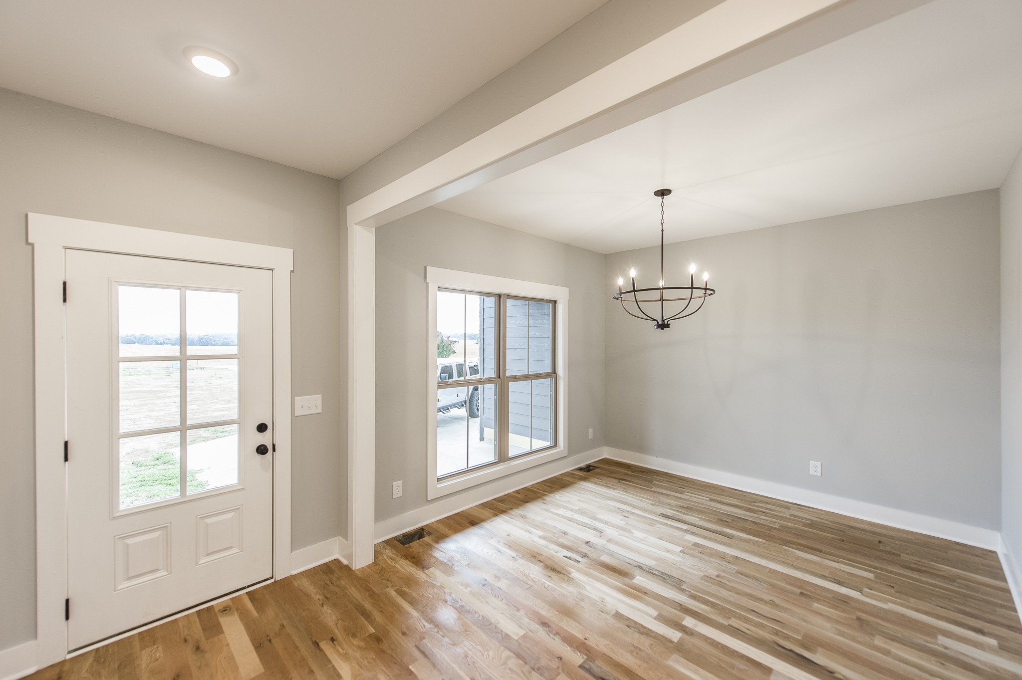 511 Clearview Road Cottontown, TN 37048 - Photo 3 of 41 a view of an empty room with wooden floor and a window