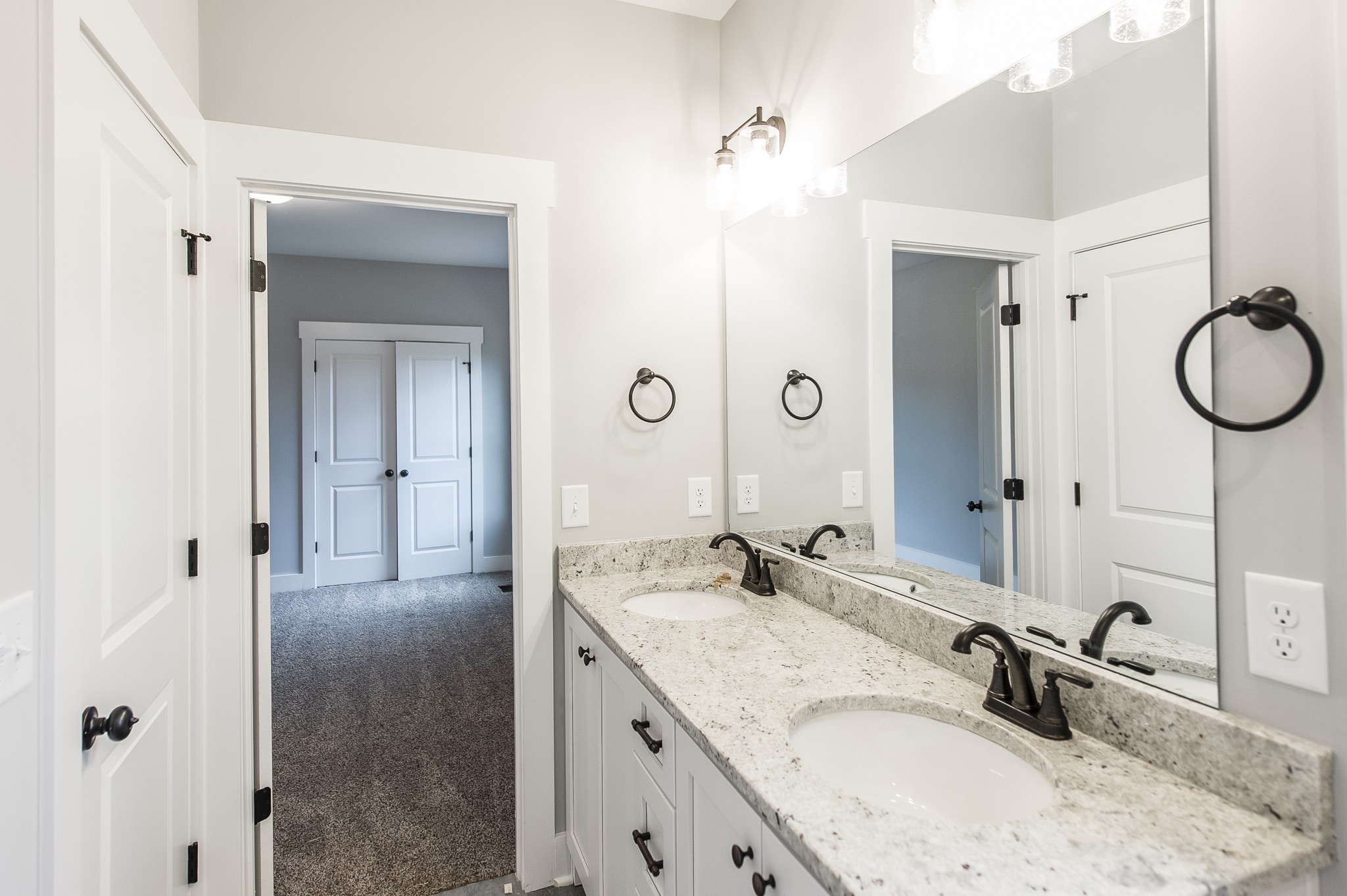 511 Clearview Road Cottontown, TN 37048 - Photo 32 of 41 a bathroom with a granite countertop sink mirror and vanity