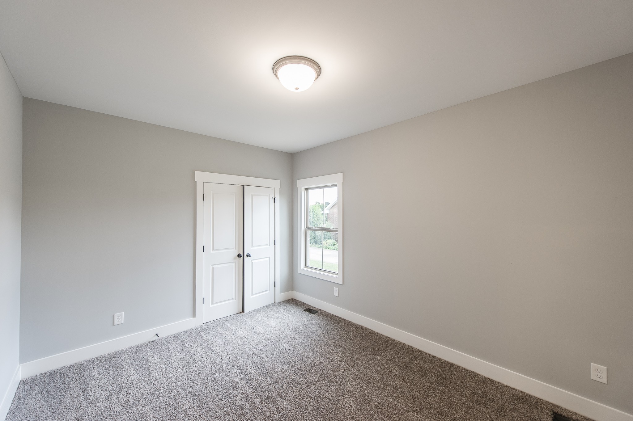 511 Clearview Road Cottontown, TN 37048 - Photo 33 of 41 an empty room with windows and closet