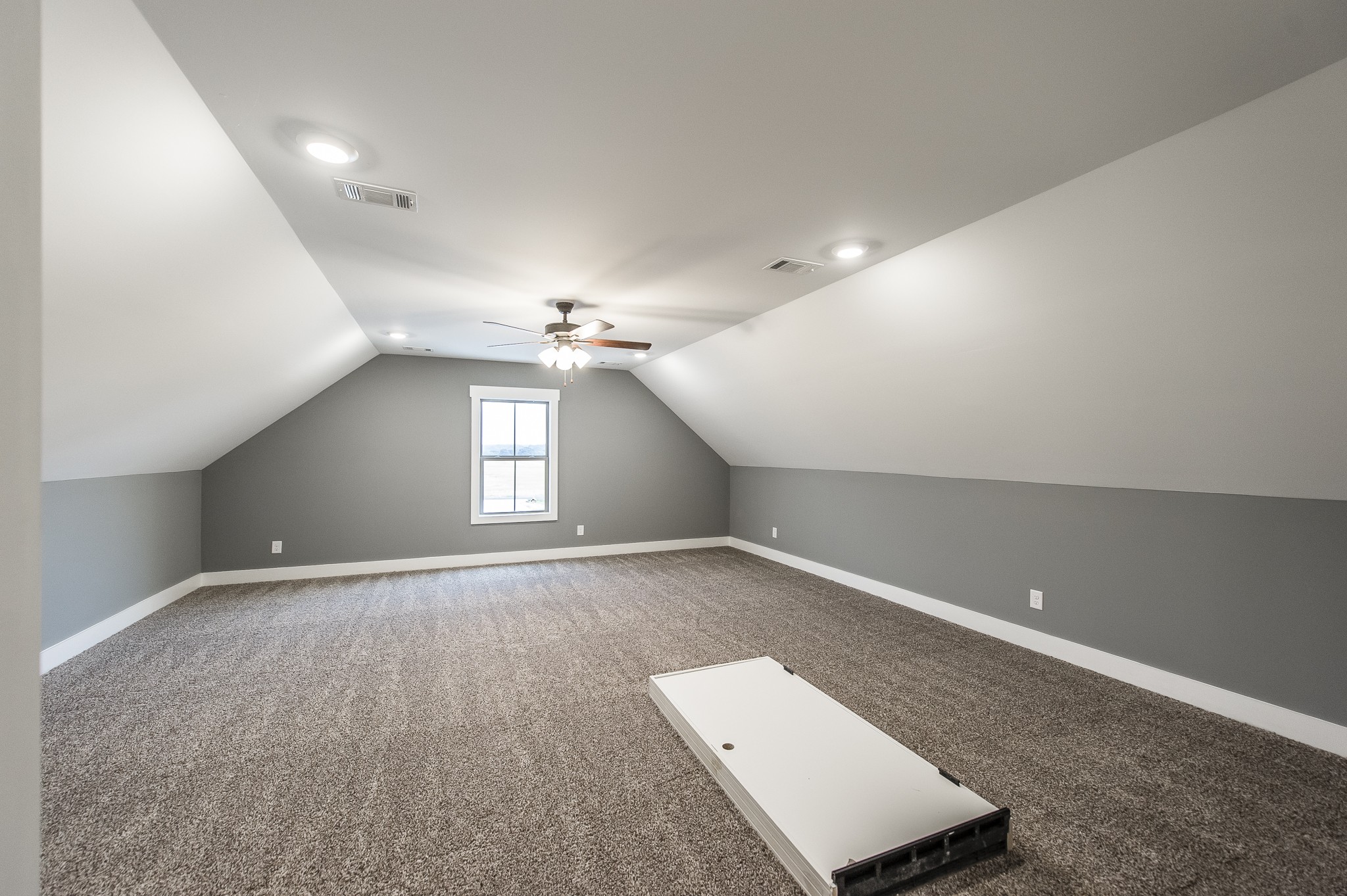 511 Clearview Road Cottontown, TN 37048 - Photo 35 of 41 en empty room with windows and ceiling fan