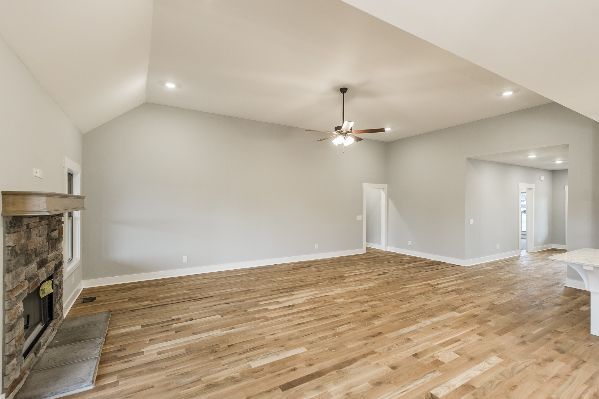 511 Clearview Road Cottontown, TN 37048 - Photo 8 of 41 an empty room with wooden floor fan and window
