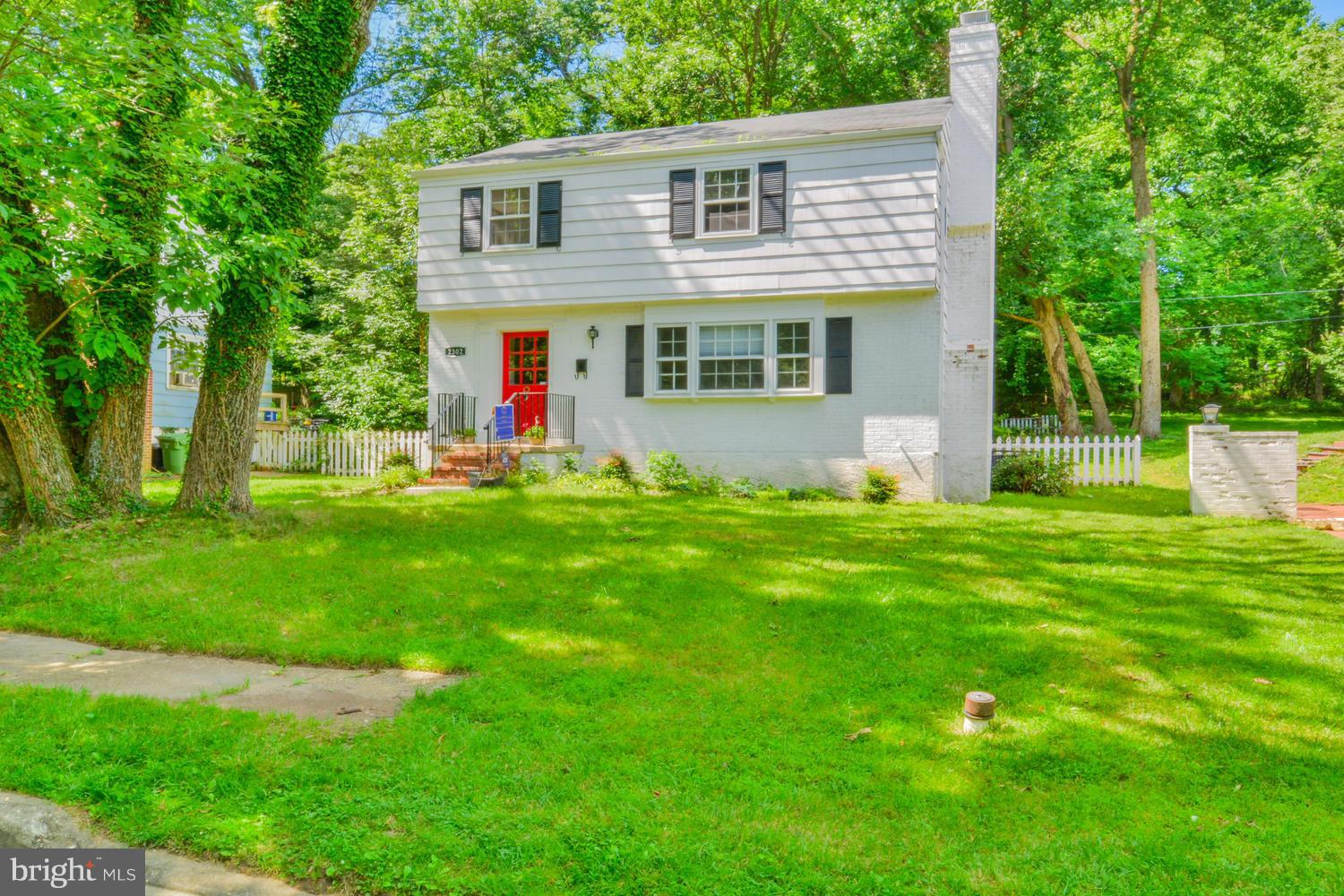 Charming colonial on tree lined street!
