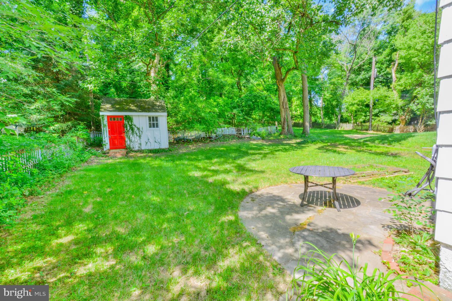 2302 Pickwick Road Baltimore, MD 21207 - Photo 2 of 30 Flagstone seating area plus functional rear shed