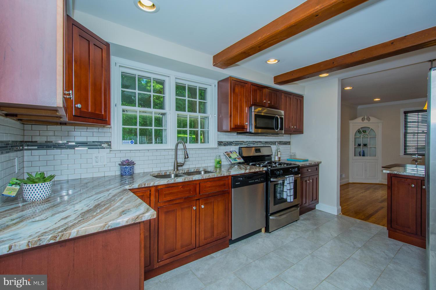 2302 Pickwick Road Baltimore, MD 21207 - Photo 13 of 30 Kitchen w gorgeous granite & SS appliances