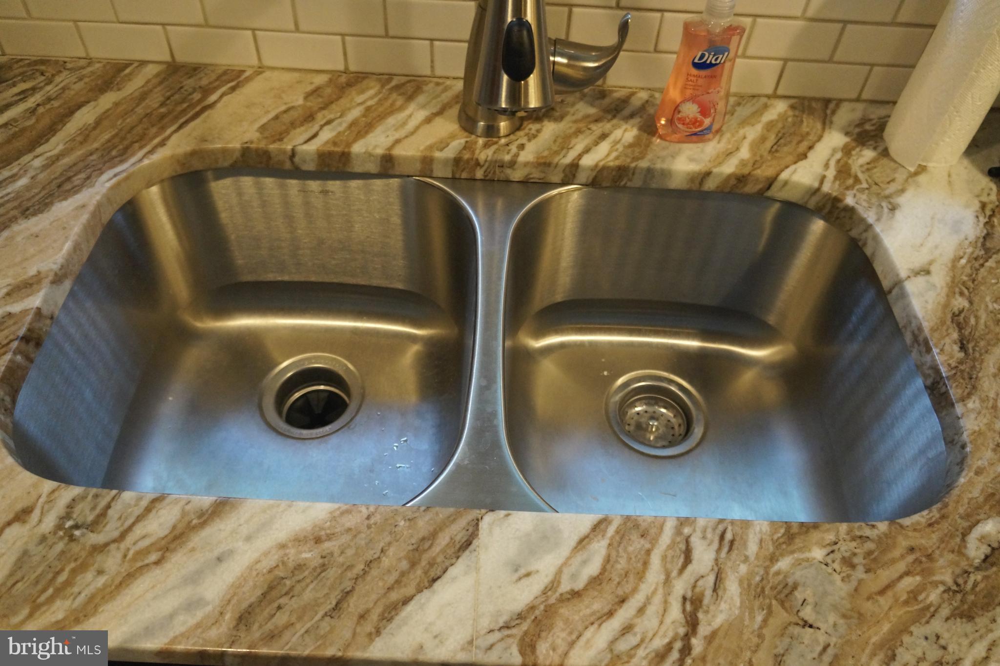 2302 Pickwick Road Baltimore, MD 21207 - Photo 15 of 30 This gorgeous granite inspires preparing food!