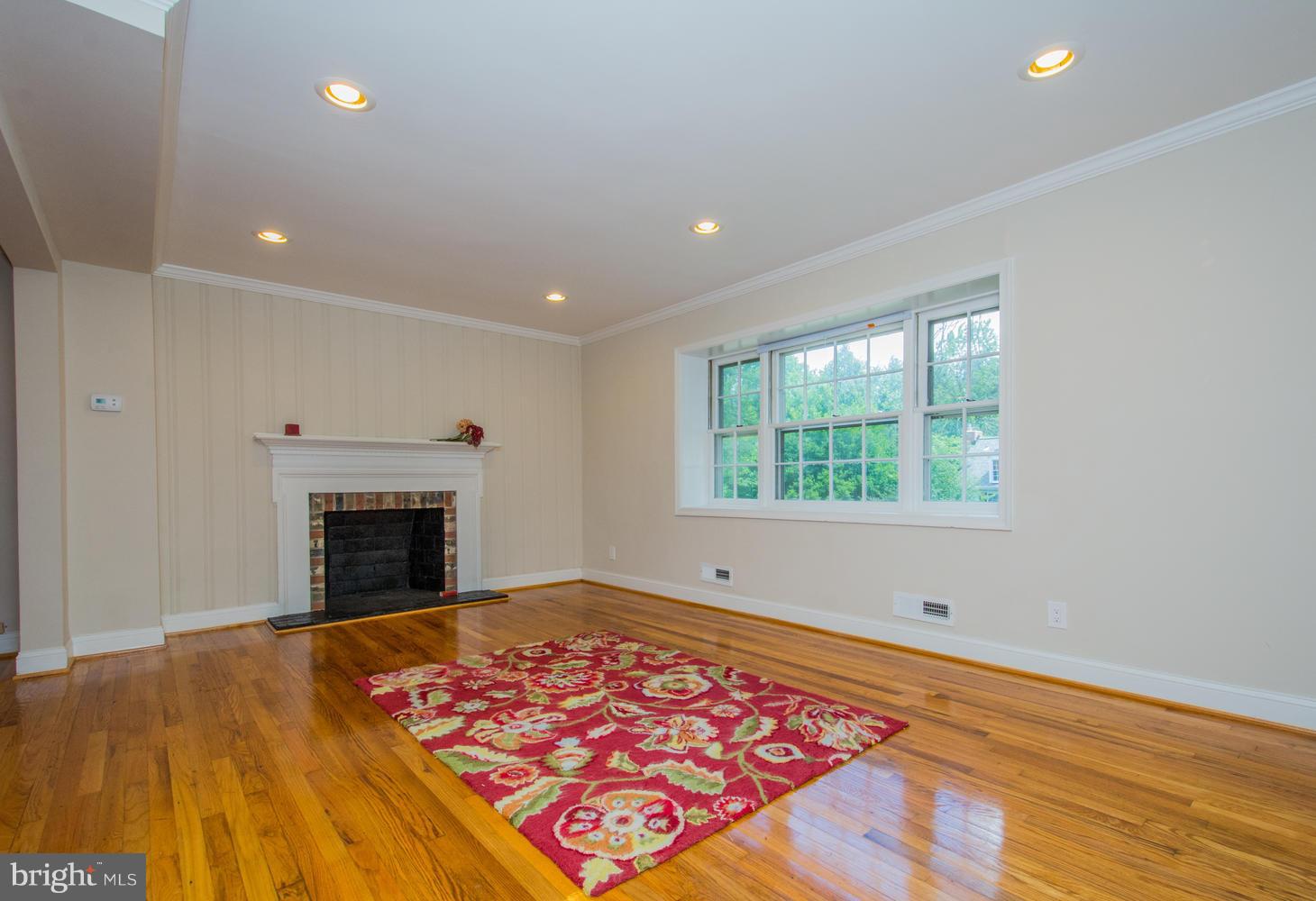 2302 Pickwick Road Baltimore, MD 21207 - Photo 8 of 30 Living Room has more gleaming hardwood floors!