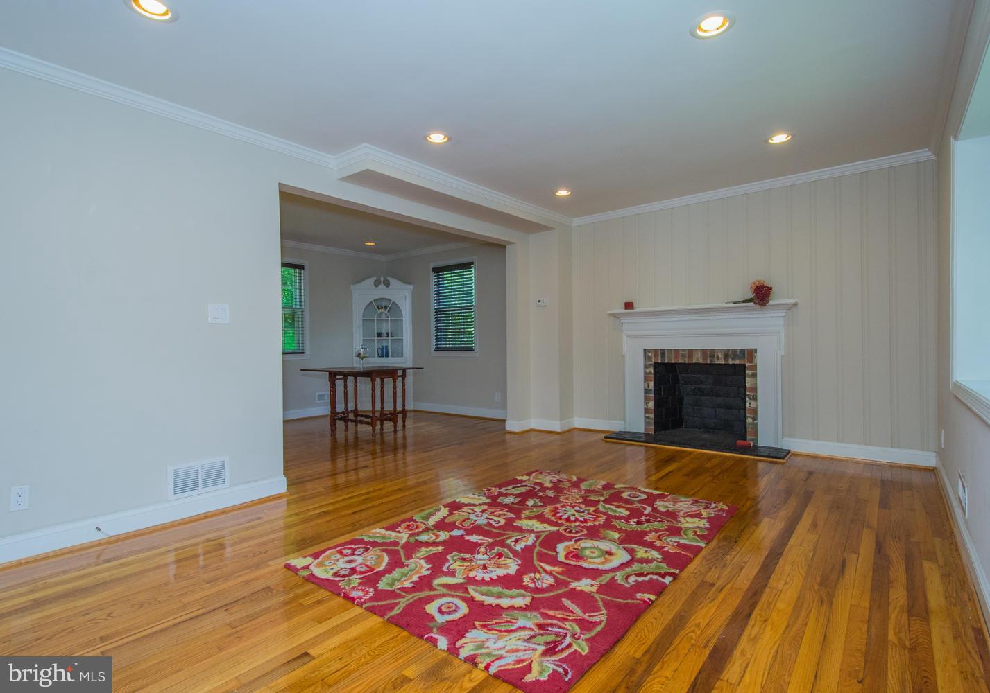 2302 Pickwick Road Baltimore, MD 21207 - Photo 9 of 30 Living Room w bay window & WB fireplace