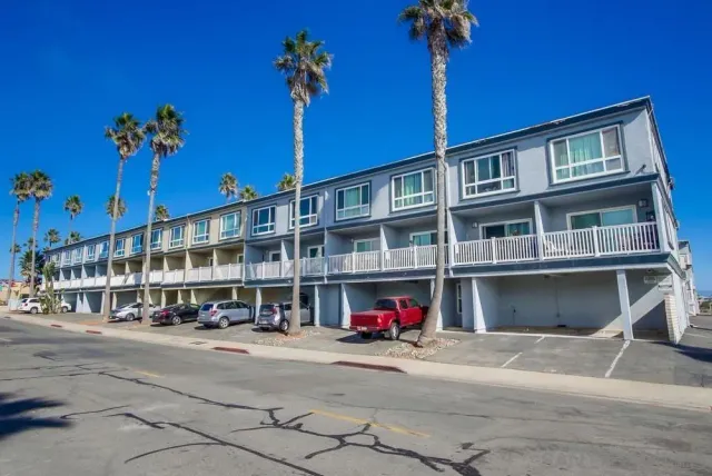 a front view of a building with street view