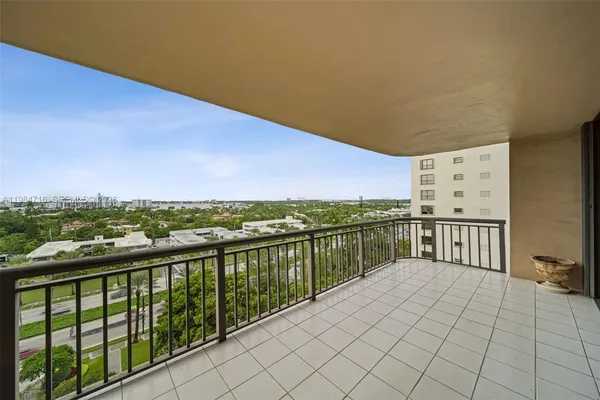 a view of a balcony with city view
