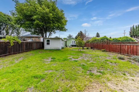 a view of backyard with green space