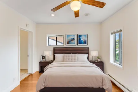 a bathroom with a shower sink and mirror