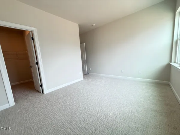an empty room with closet