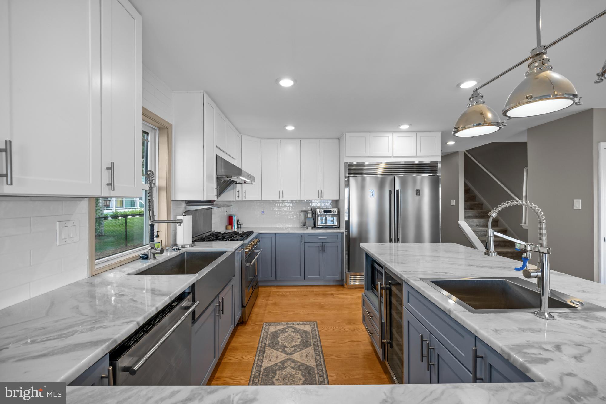 1 Risner Avenue Penns Grove, NJ 08069 - Photo 11 of 45 a kitchen with stainless steel appliances granite countertop sink stove top oven and refrigerator