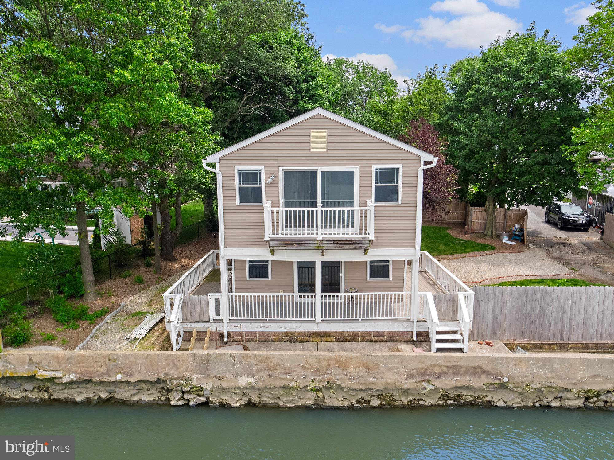 1 Risner Avenue Penns Grove, NJ 08069 - Photo 2 of 45 a front view of a house with a yard