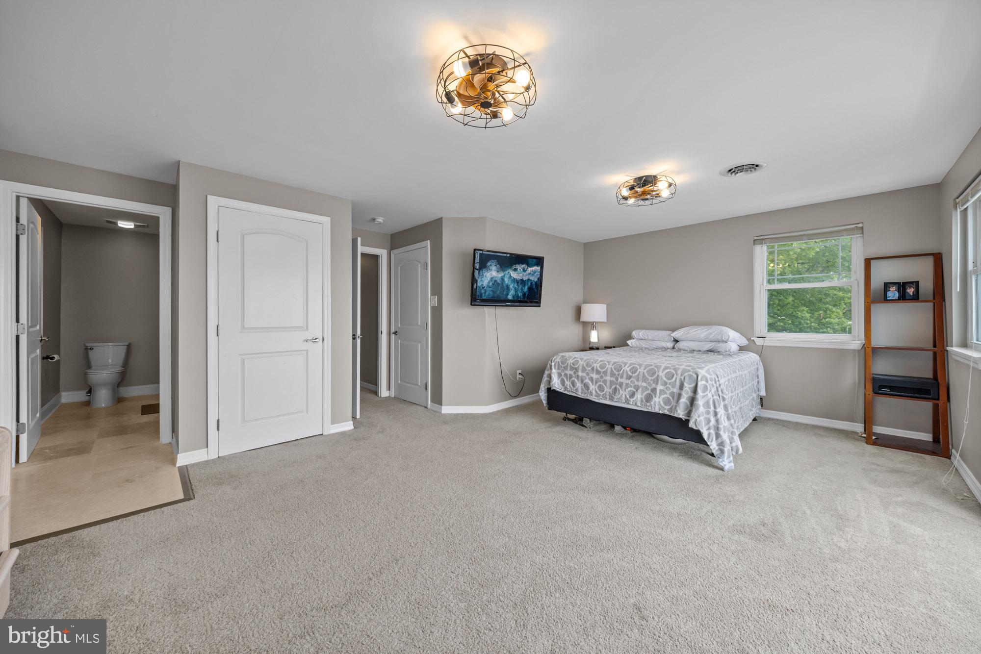 1 Risner Avenue Penns Grove, NJ 08069 - Photo 22 of 45 a spacious bedroom with a bed and a cabinets
