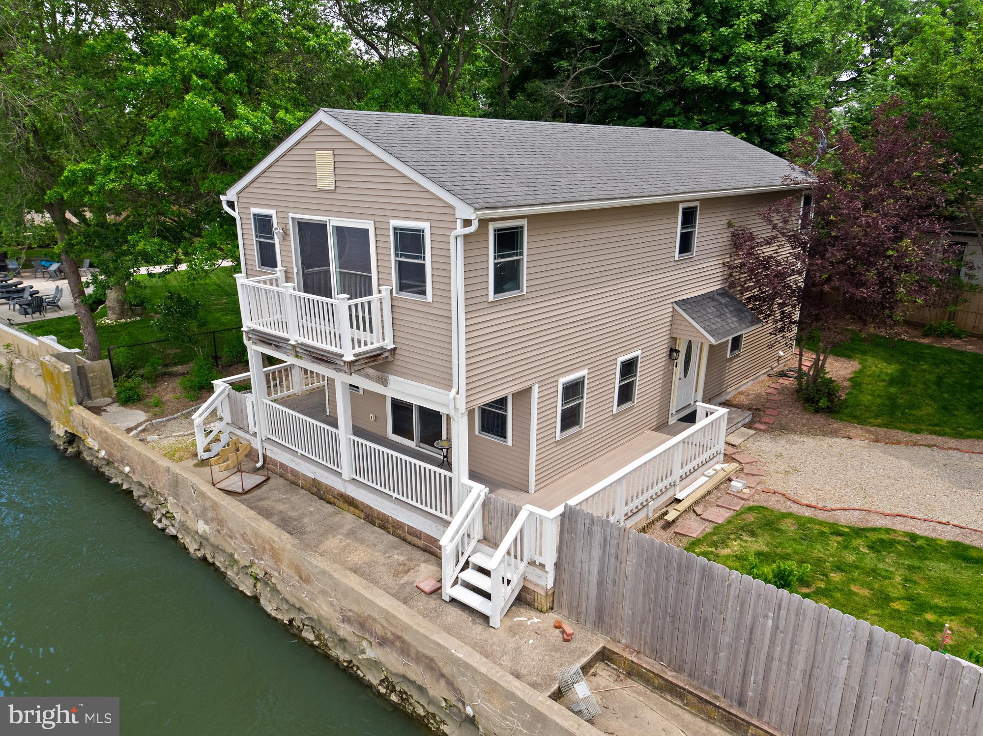 1 Risner Avenue Penns Grove, NJ 08069 - Photo 35 of 45 a house with river in front of it