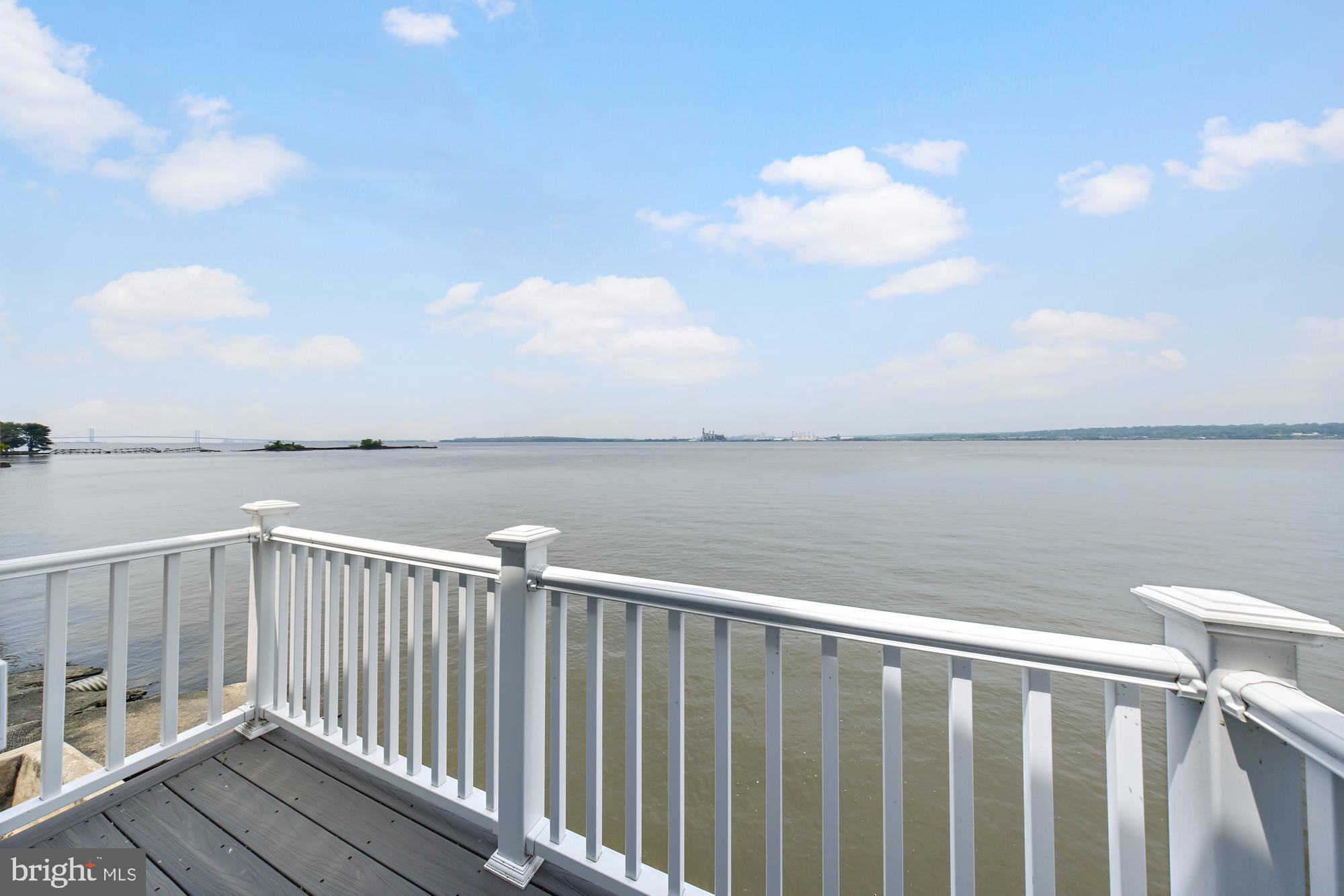 1 Risner Avenue Penns Grove, NJ 08069 - Photo 42 of 45 a view of roof deck with wooden floor and fence