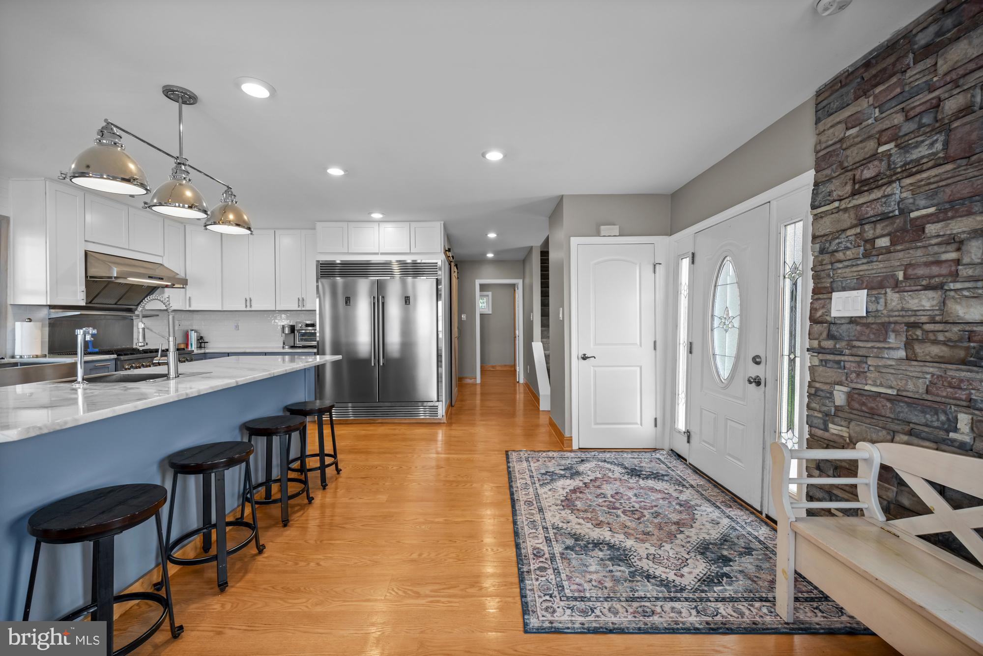 1 Risner Avenue Penns Grove, NJ 08069 - Photo 6 of 45 a large kitchen with cabinets table and chairs