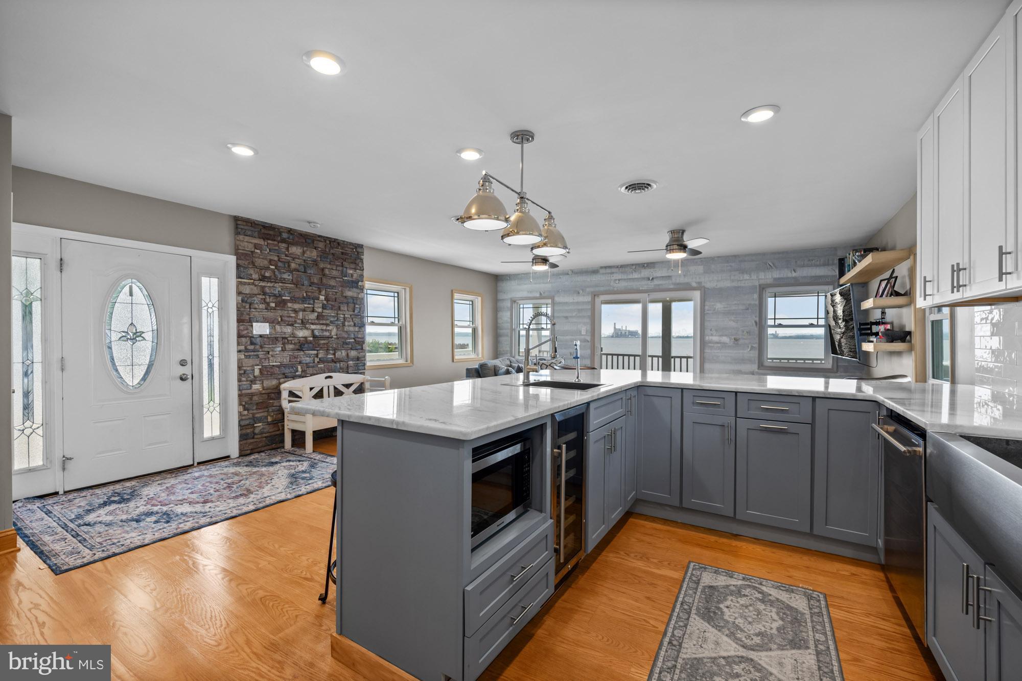 1 Risner Avenue Penns Grove, NJ 08069 - Photo 8 of 45 a kitchen with stainless steel appliances granite countertop a sink and stove top oven
