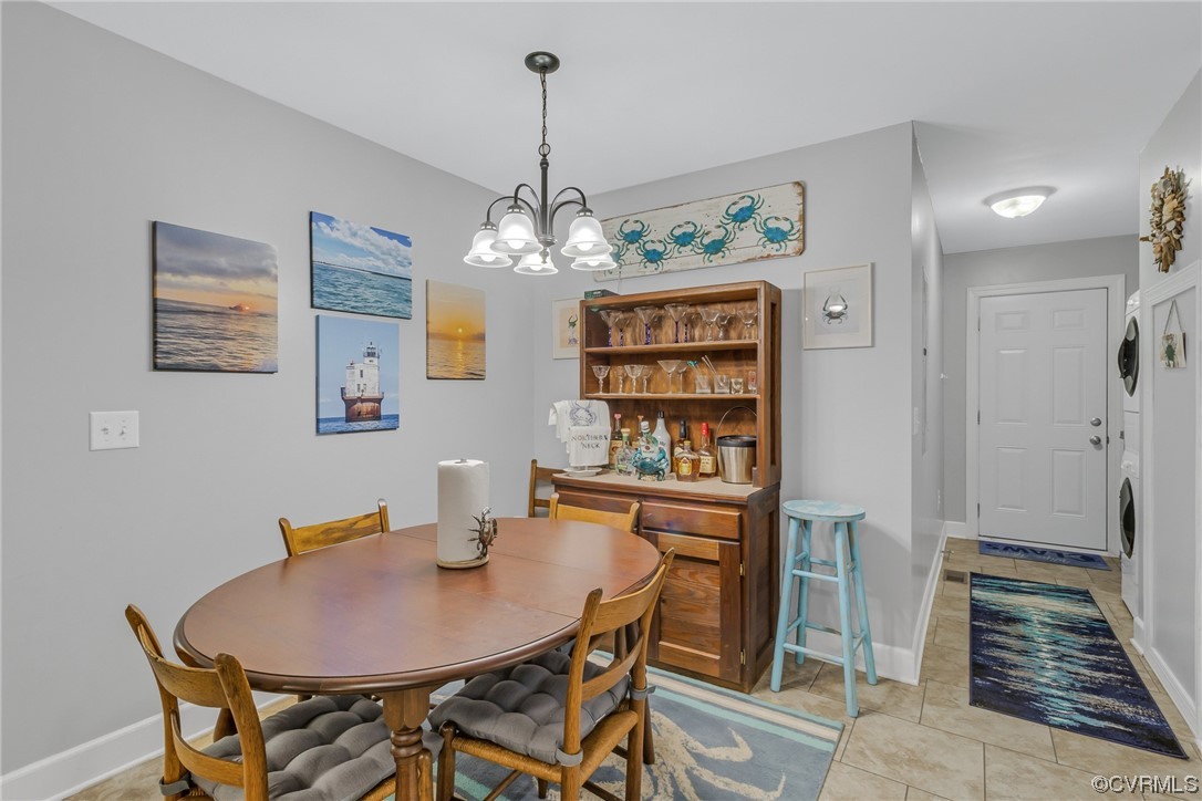 79 Lucom Point Drive Reedville, VA 22539 - Photo 30 of 32 a dining room with furniture and window
