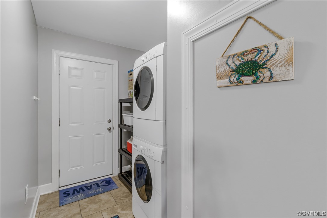 79 Lucom Point Drive Reedville, VA 22539 - Photo 32 of 32 a utility room with dryer and washer