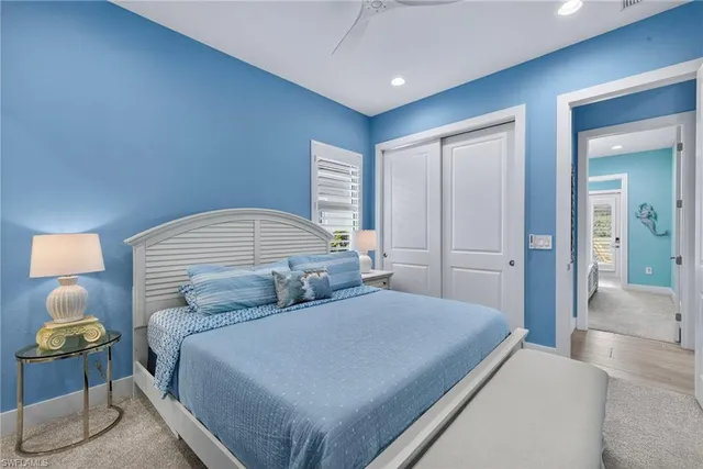 a bedroom with a bed and a table