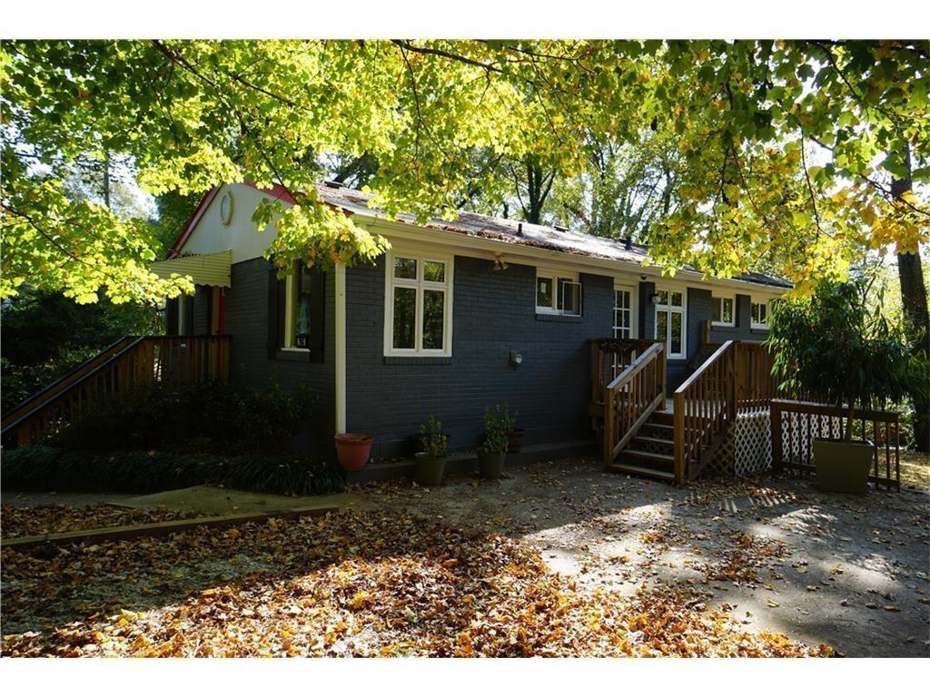 1943 Wee Kirk Road Southeast Atlanta, GA 30316 - Photo 1 of 1 a view of a house with a yard