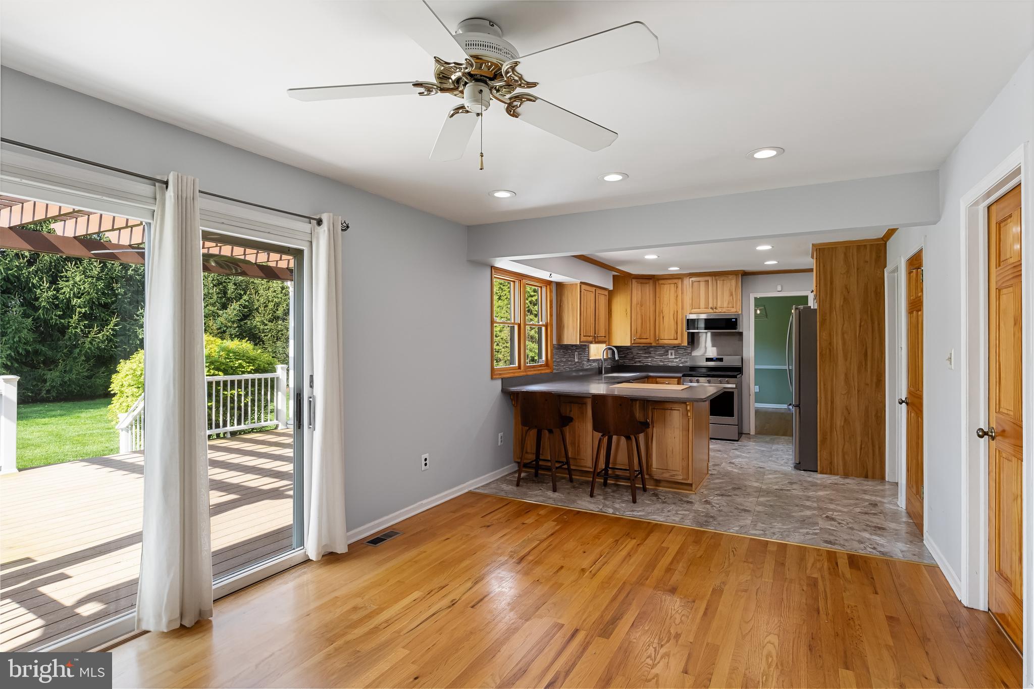 10 Mindy Drive Moorestown, NJ 08057 - Photo 16 of 29 a view of a kitchen with dining room and wooden floor