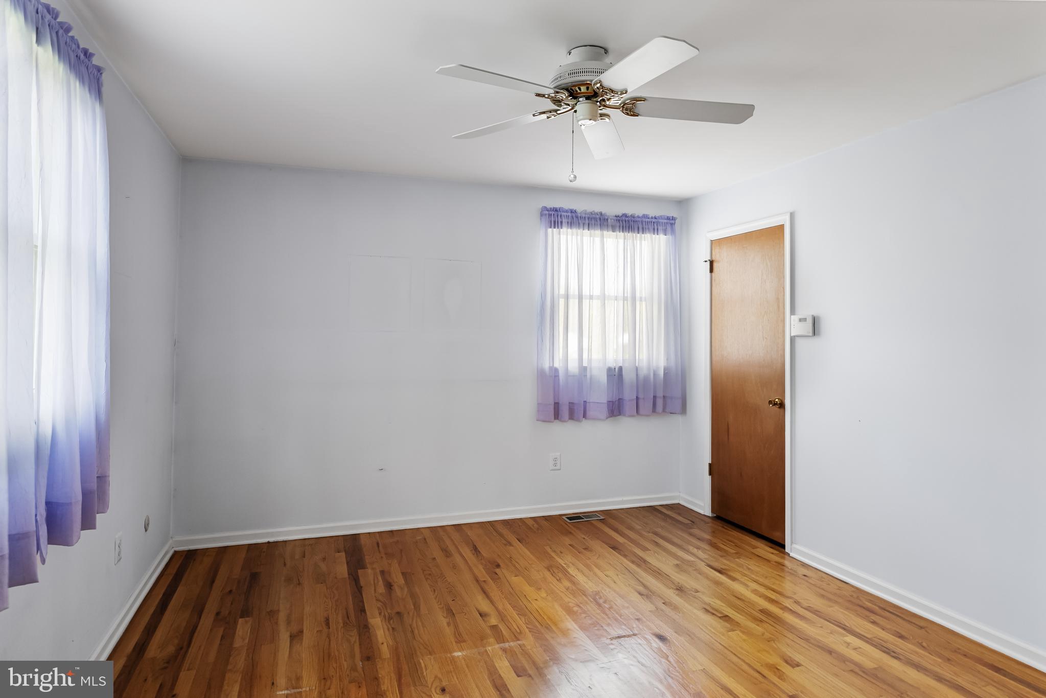 10 Mindy Drive Moorestown, NJ 08057 - Photo 19 of 29 a view of empty room with wooden floor and fan