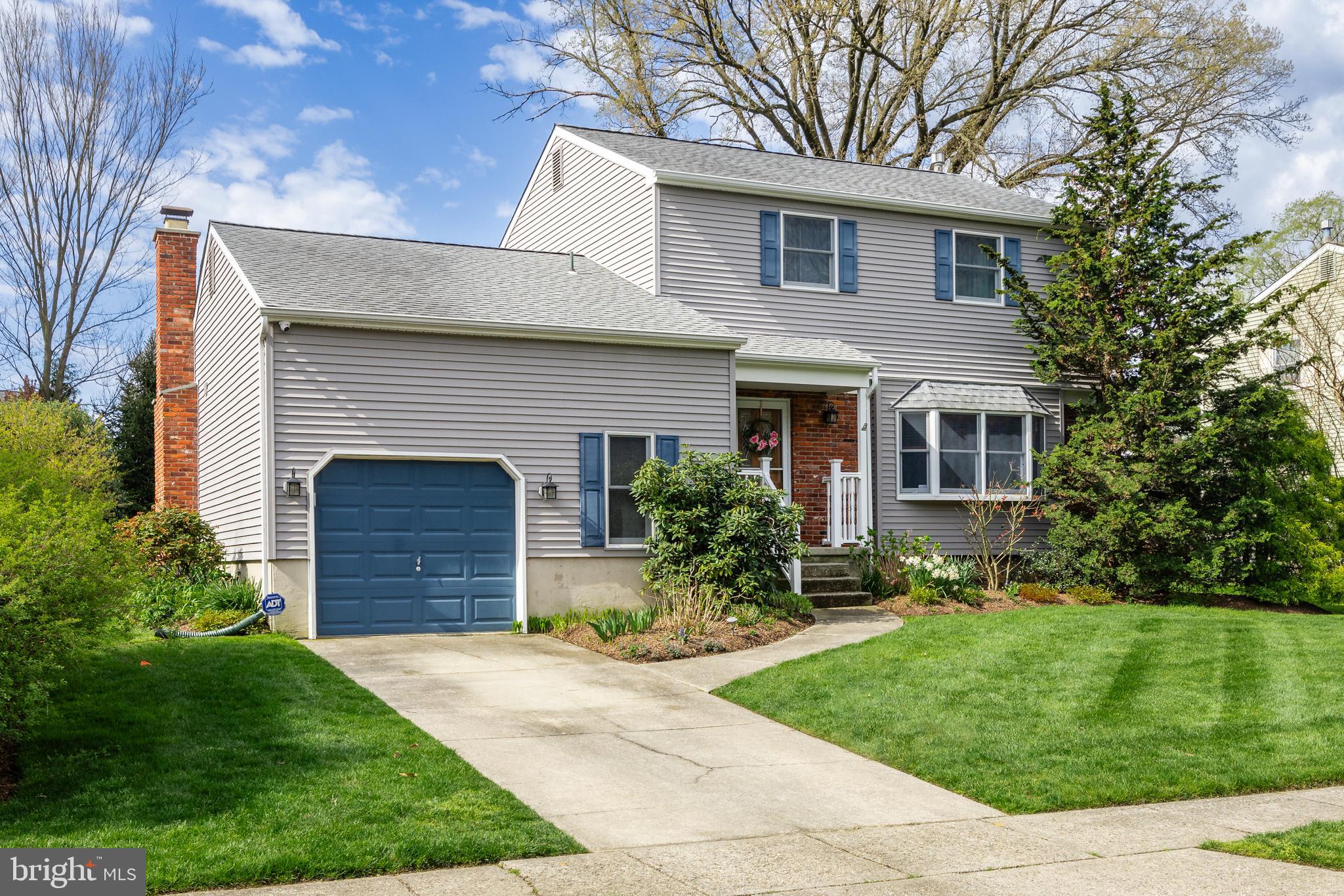 10 Mindy Drive Moorestown, NJ 08057 - Photo 2 of 29 a front view of a house with a garden