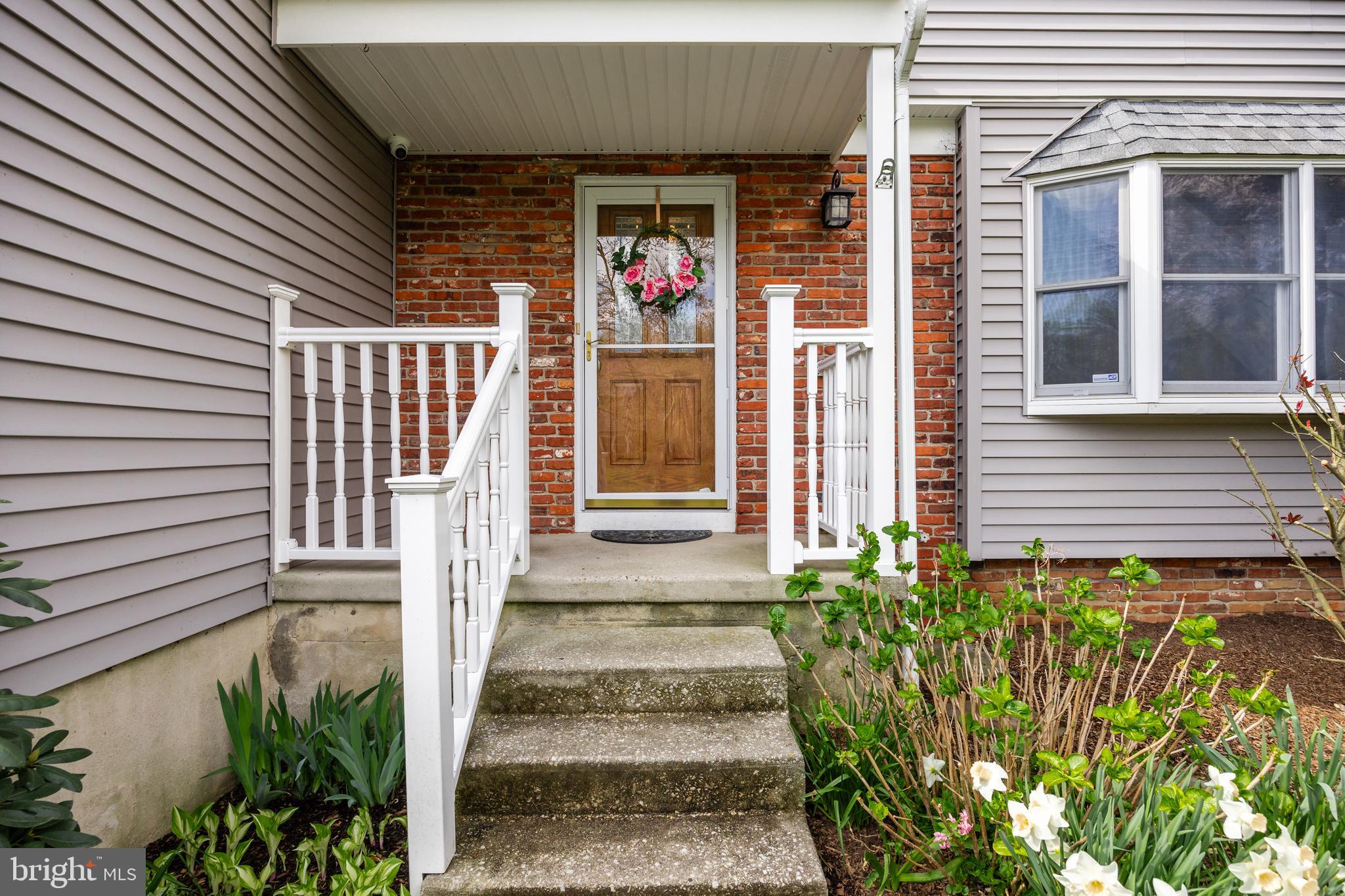 10 Mindy Drive Moorestown, NJ 08057 - Photo 3 of 29 a view of a pathway of the house front of house