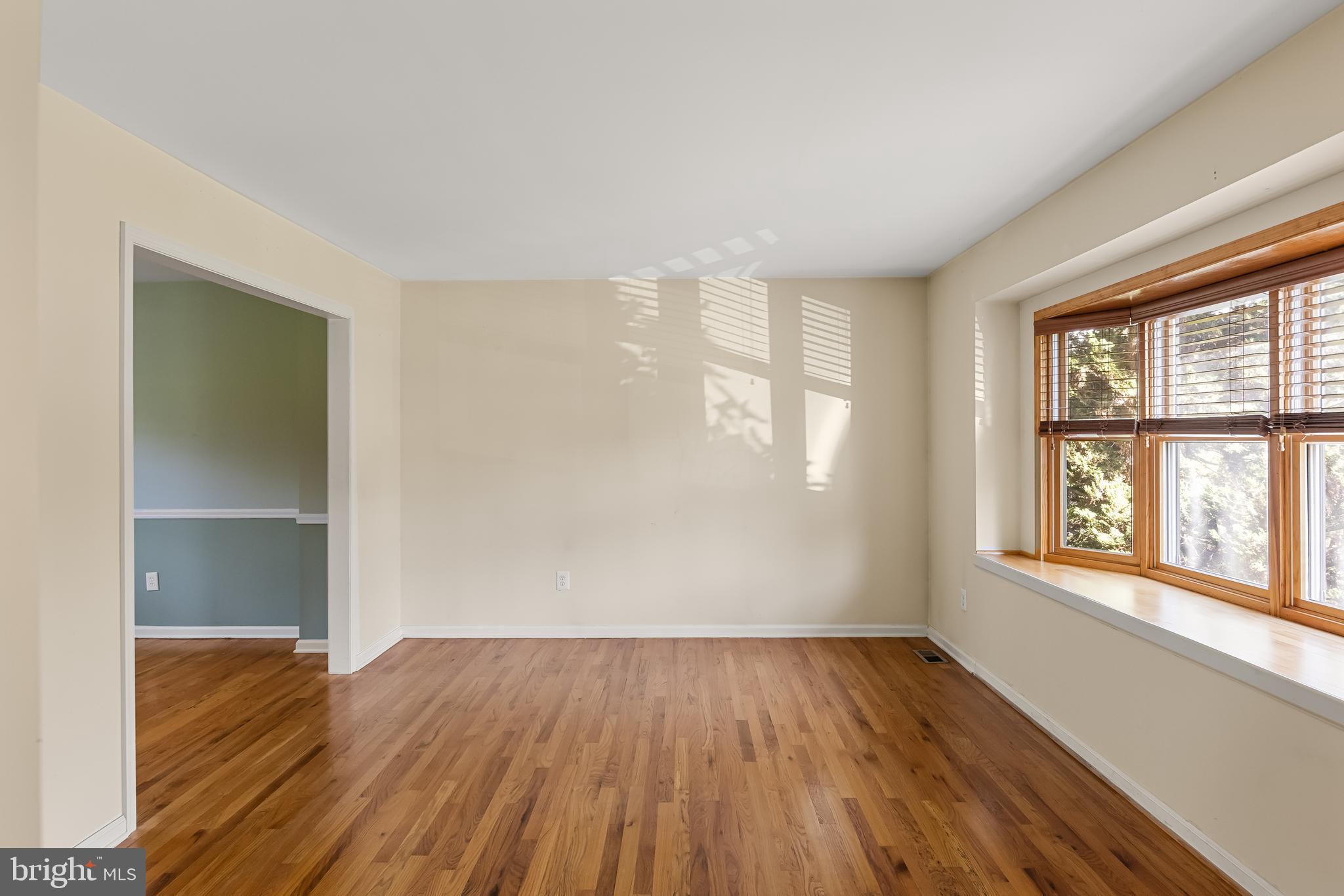 10 Mindy Drive Moorestown, NJ 08057 - Photo 5 of 29 an empty room with wooden floor and windows