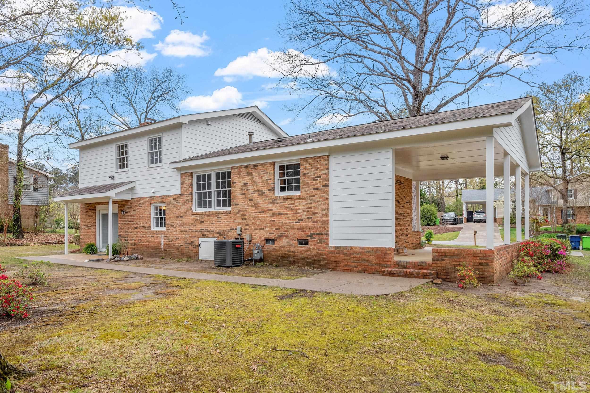 4108 Willow Oak Road Raleigh, NC 27604 - Photo 32 of 35 a view of a house with a patio