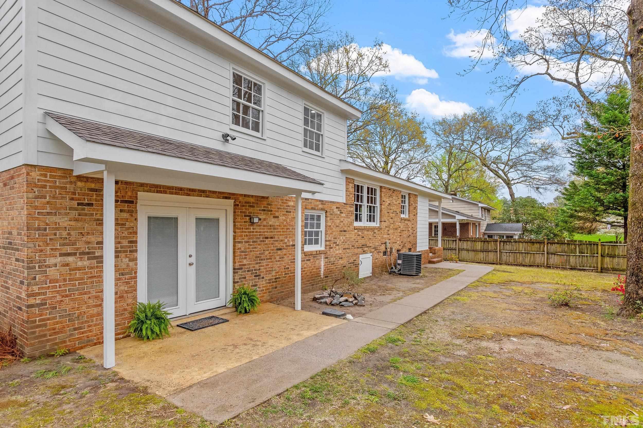 4108 Willow Oak Road Raleigh, NC 27604 - Photo 33 of 35 a front view of a house with garden
