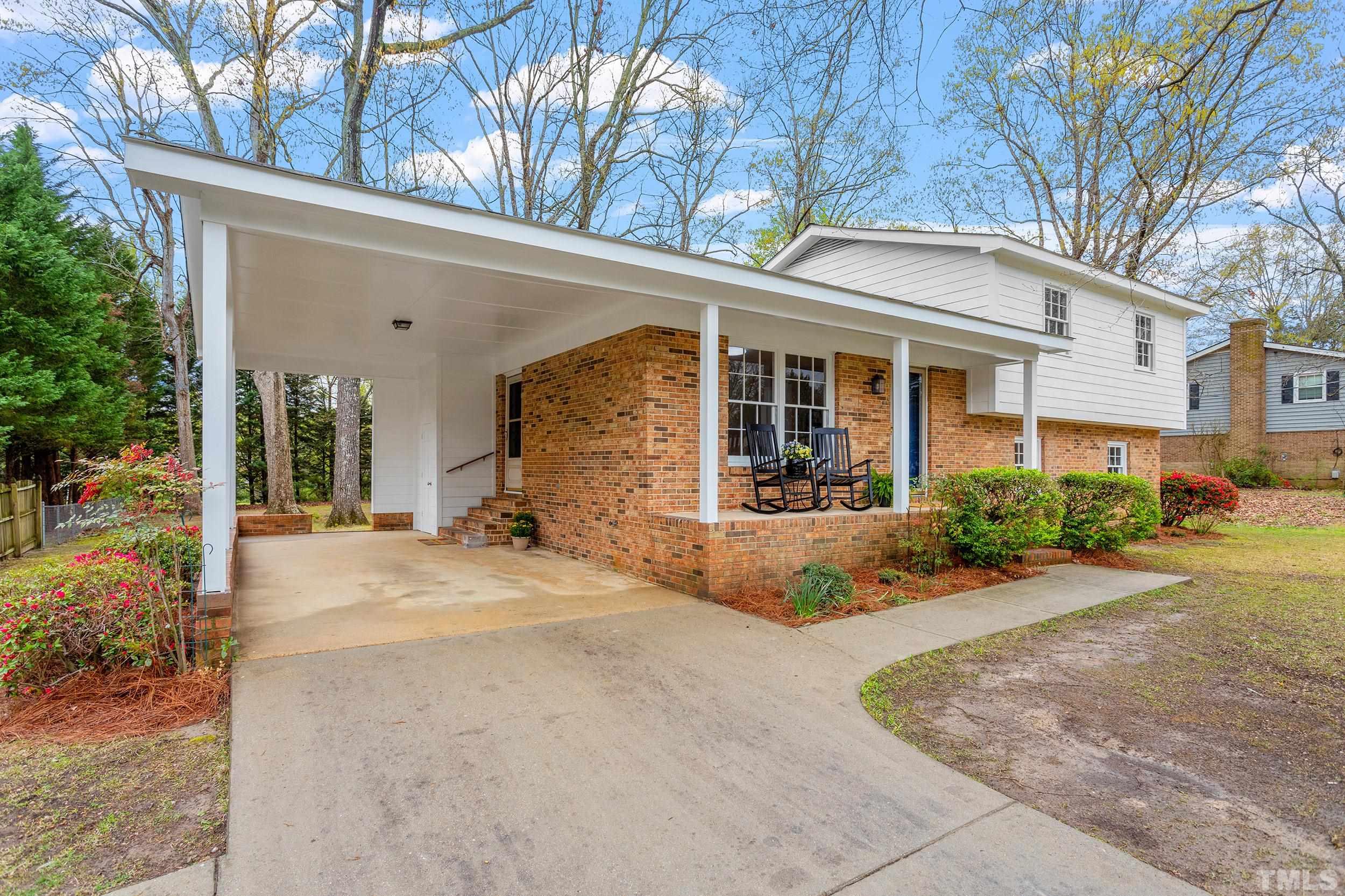 4108 Willow Oak Road Raleigh, NC 27604 - Photo 6 of 35 a view of a house with a patio
