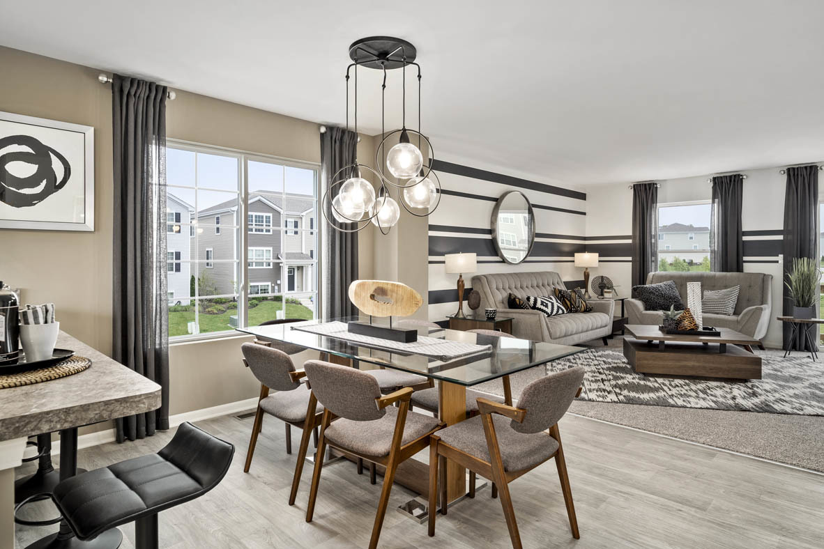 3732 Bailey Road Yorkville, IL 60560 - Photo 6 of 20 a view of a dining room with furniture large windows and wooden floor