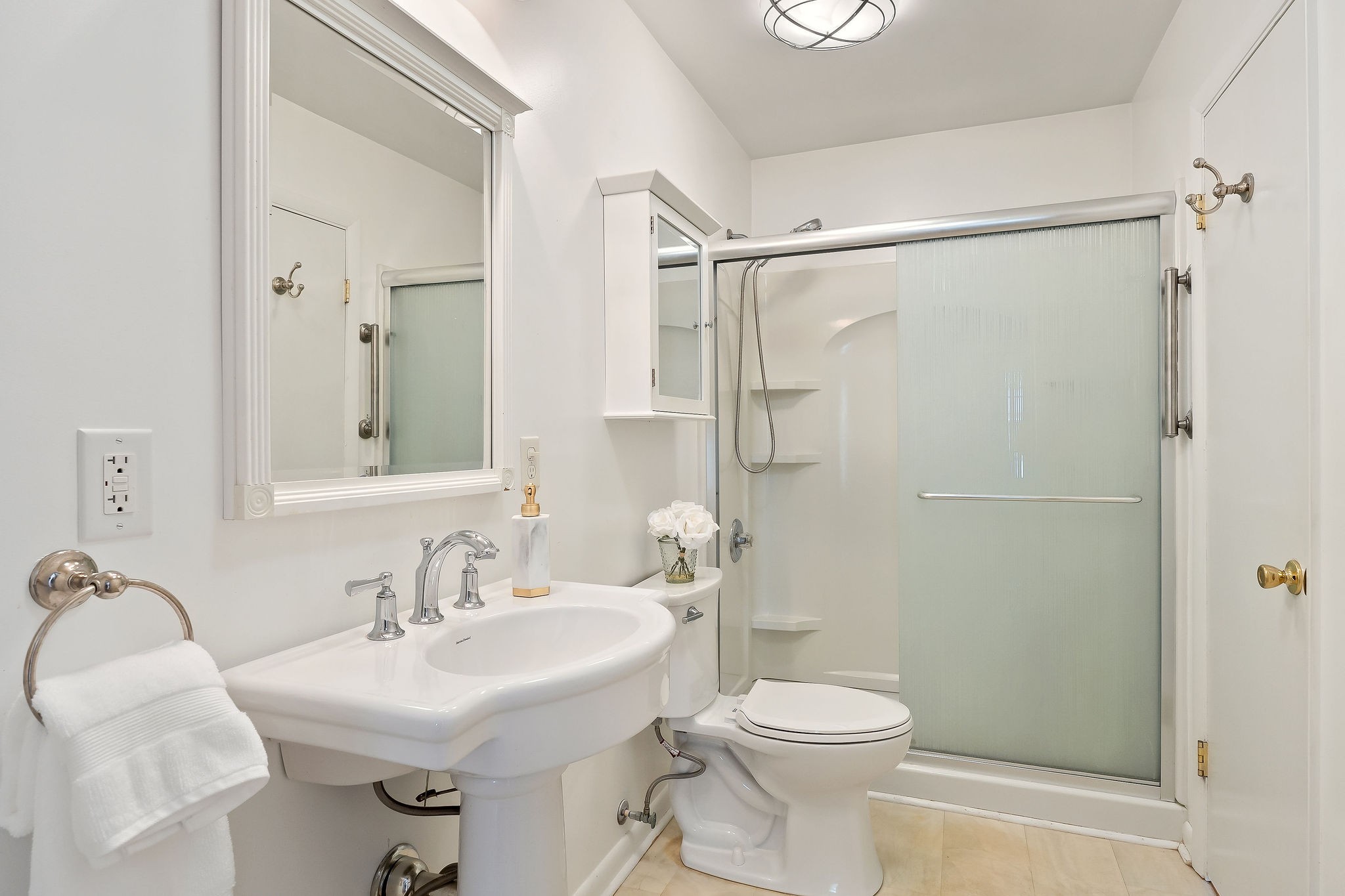 1175 Meadow Road Cookeville, TN 38501 - Photo 17 of 37 a bathroom with a sink toilet and shower