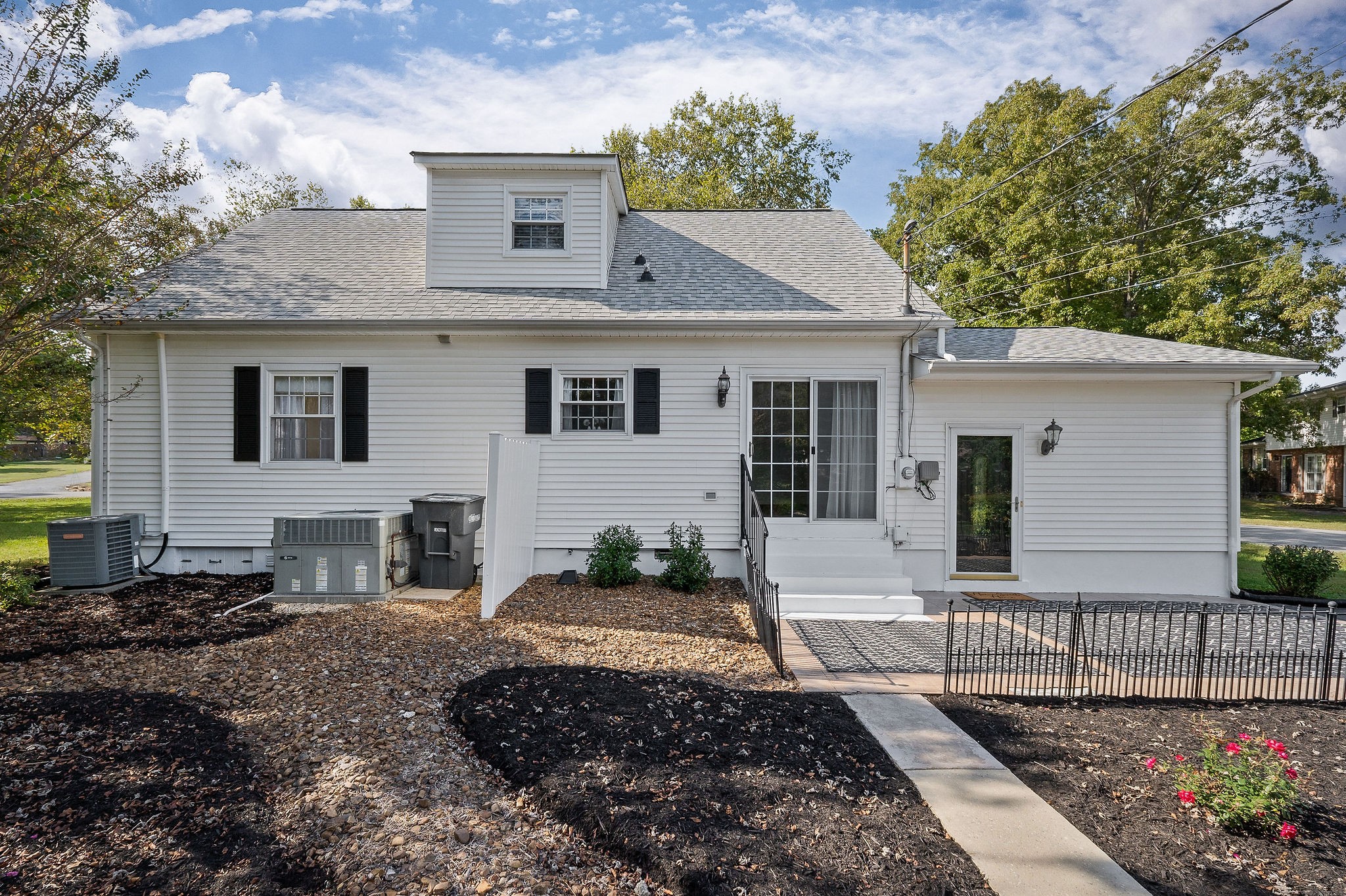 1175 Meadow Road Cookeville, TN 38501 - Photo 2 of 37 a front view of a house with garden