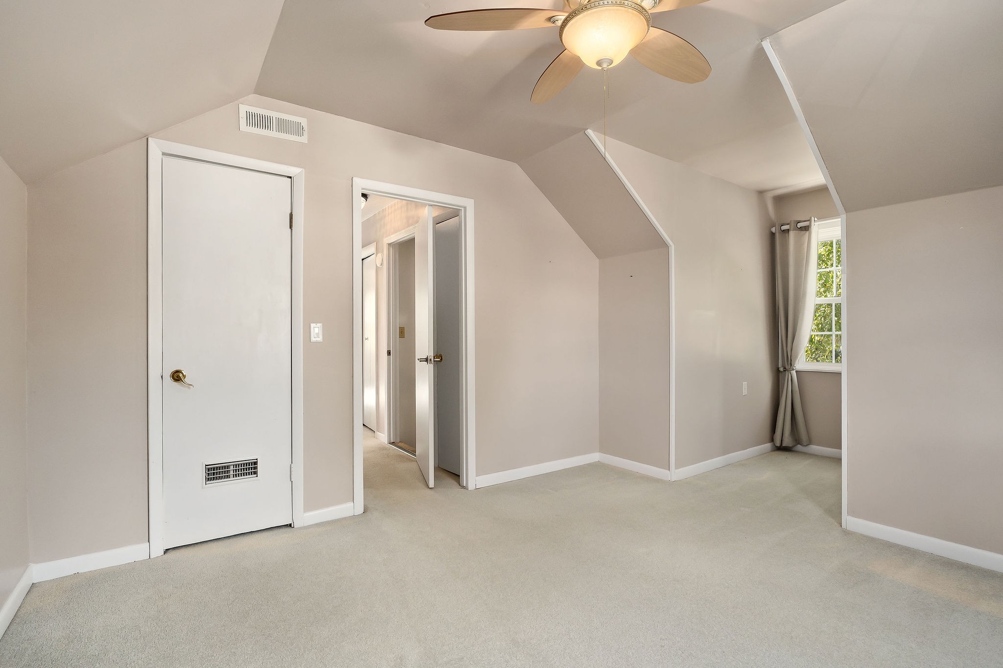 1175 Meadow Road Cookeville, TN 38501 - Photo 26 of 37 a view of an empty room and chandelier fan