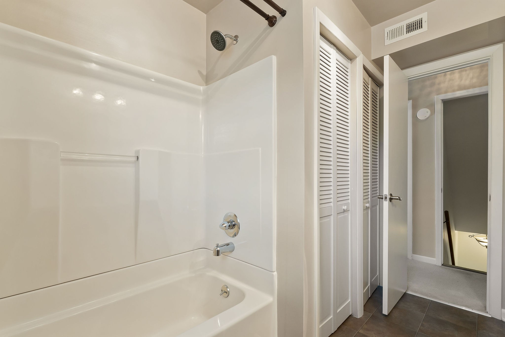 1175 Meadow Road Cookeville, TN 38501 - Photo 28 of 37 a bathroom with a bathtub and a shower