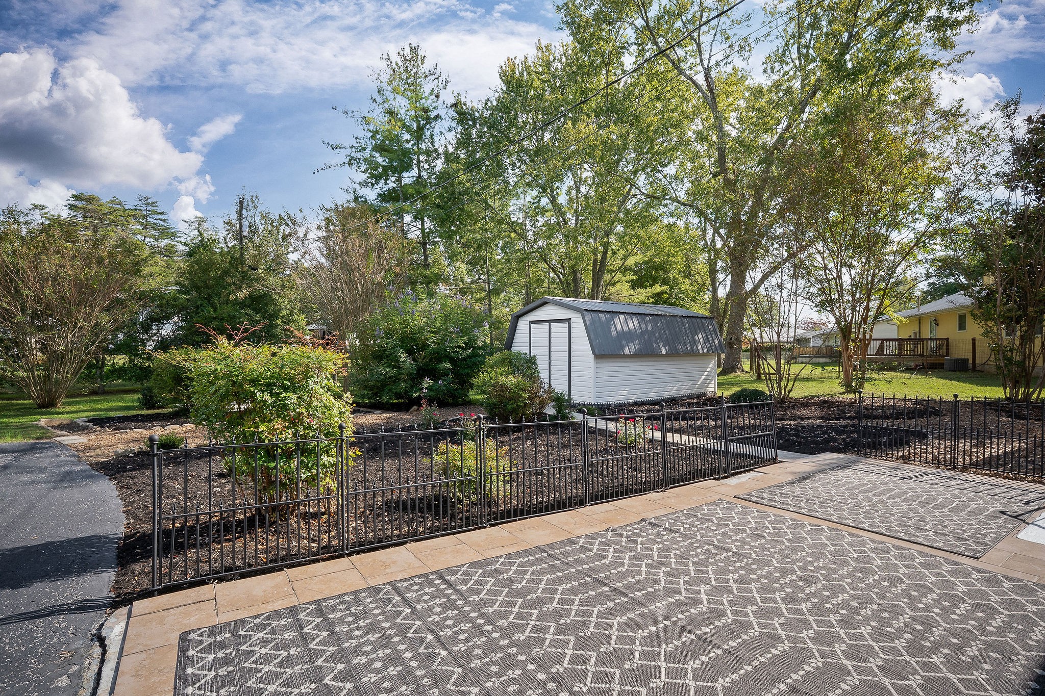 1175 Meadow Road Cookeville, TN 38501 - Photo 3 of 37 a backyard of a house with lots of green space