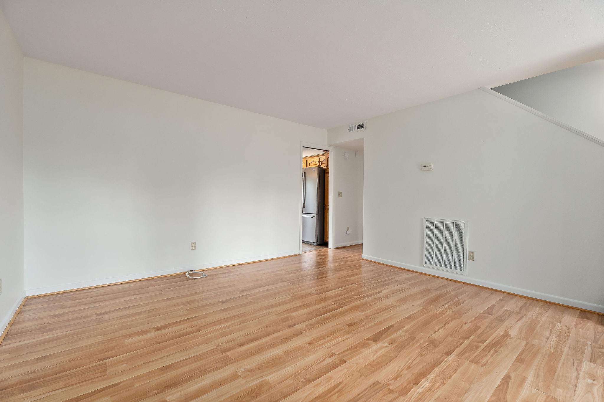 1175 Meadow Road Cookeville, TN 38501 - Photo 5 of 37 a view of an empty room and wooden floor