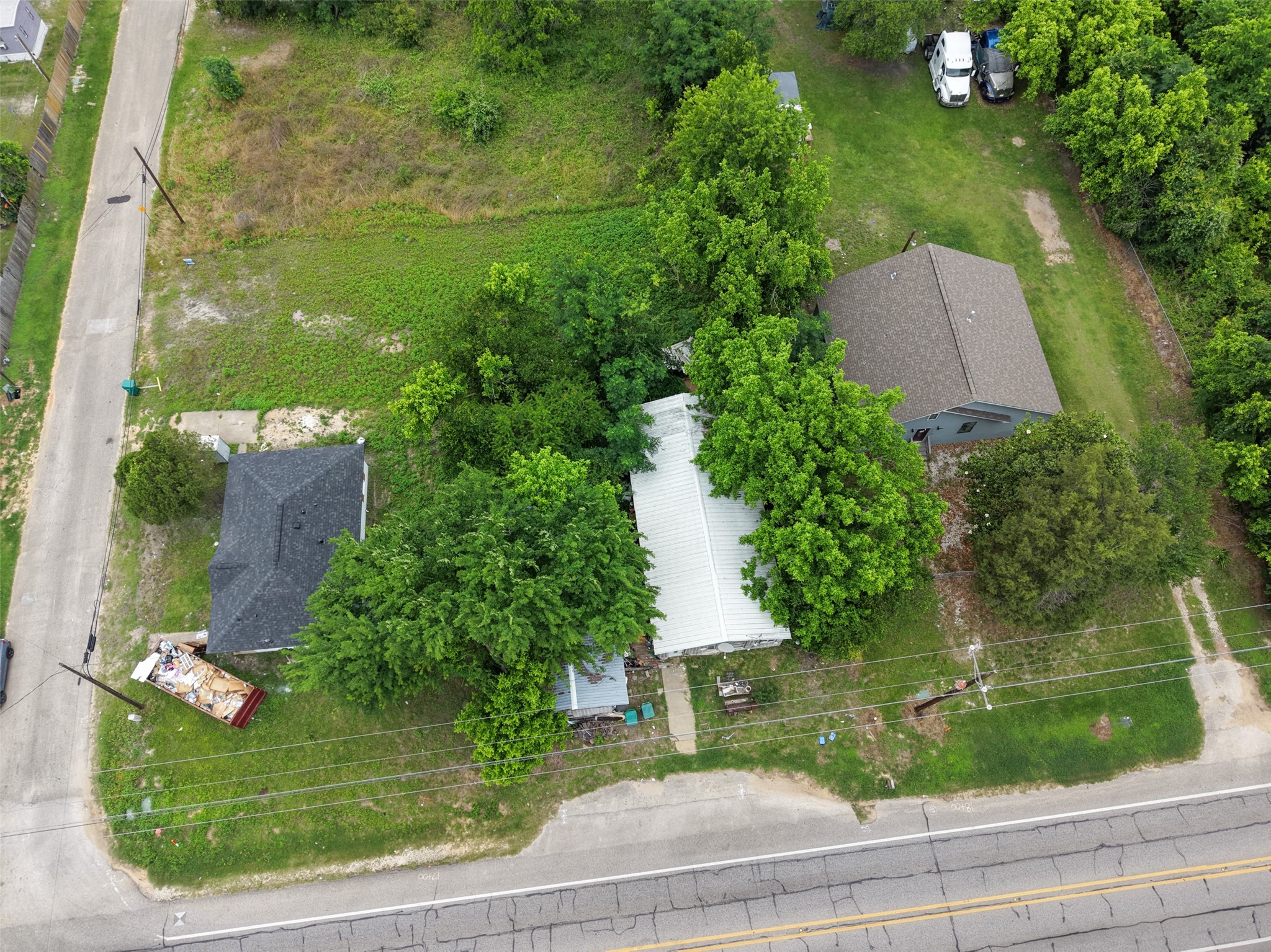 0 Mill Street Willis, TX 77378 - Photo 23 of 24 an aerial view of a house