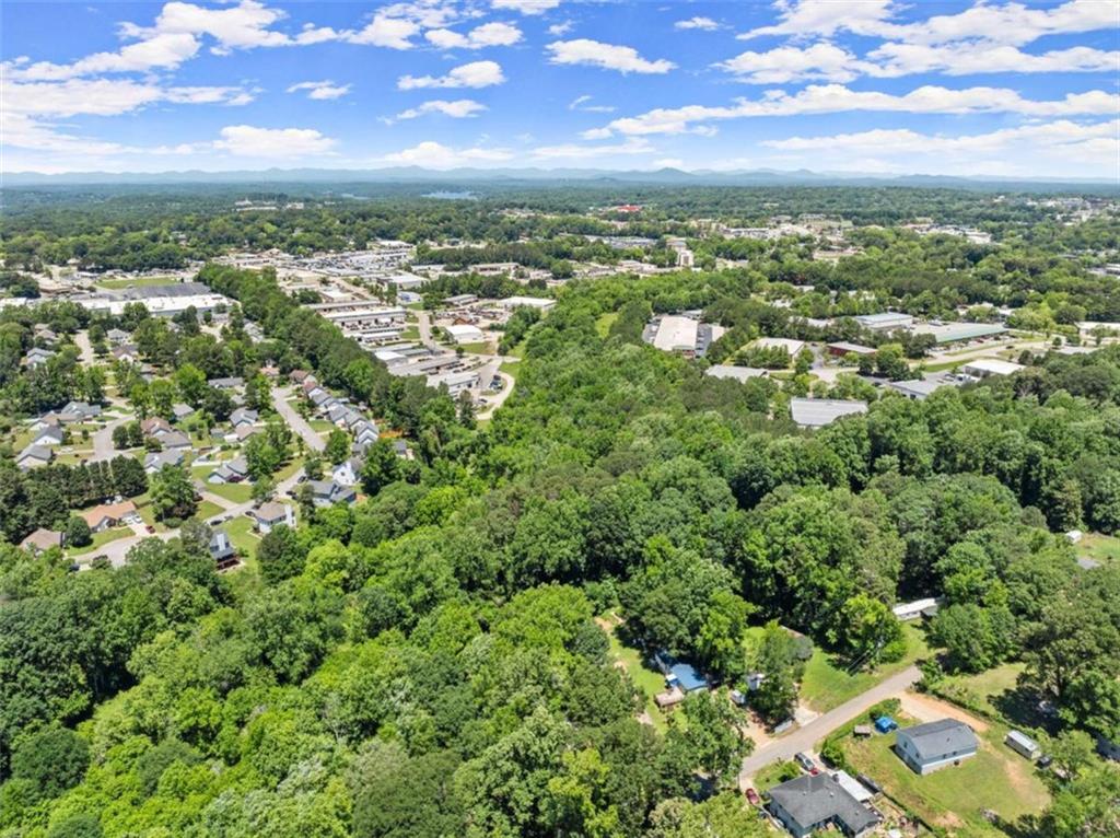 0 Hilton Southwest Drive Gainesville, GA 30501 - Photo 9 of 21 an aerial view of residential houses with outdoor space and trees
