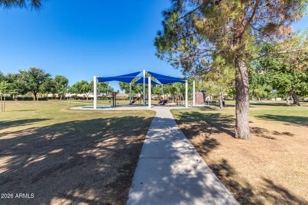 a view of a patio with a yard