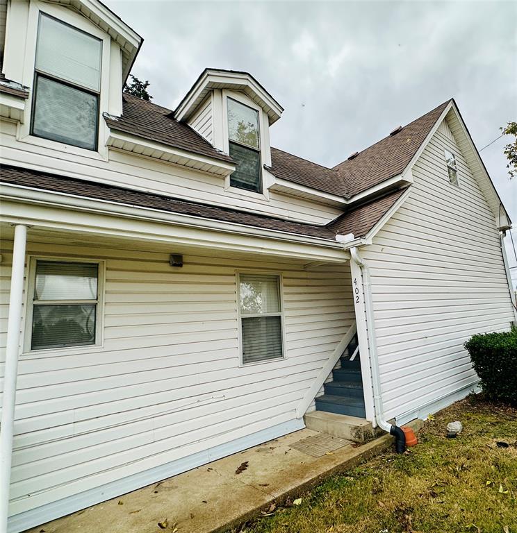 402 South Bryan-Belt Line Road Mesquite, TX 75149 - Photo 2 of 14 a view of a house with large windows