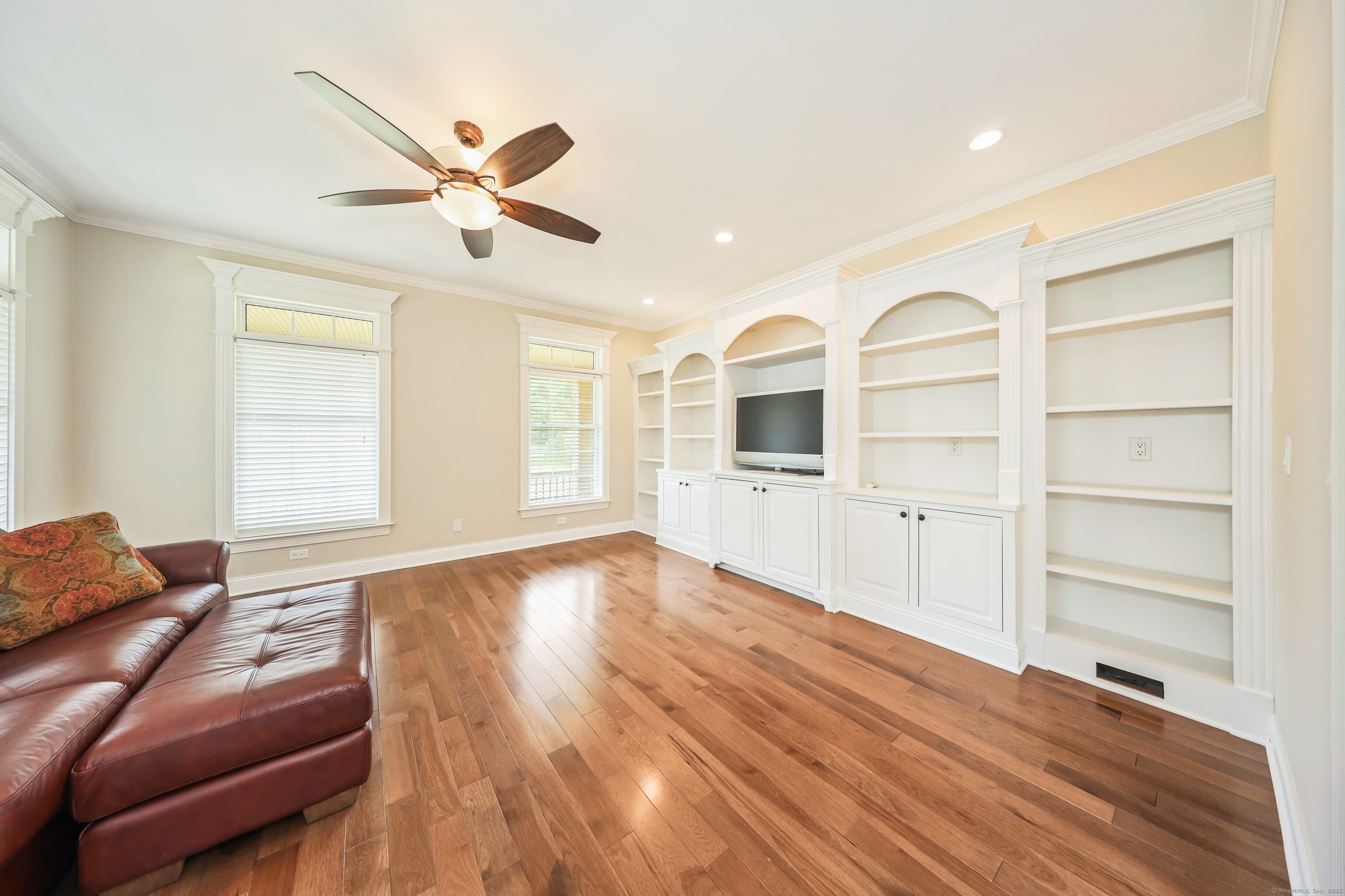 17 Hunters Ridge Wolcott, CT 06716 - Photo 14 of 40 a living room with furniture and ceiling fan