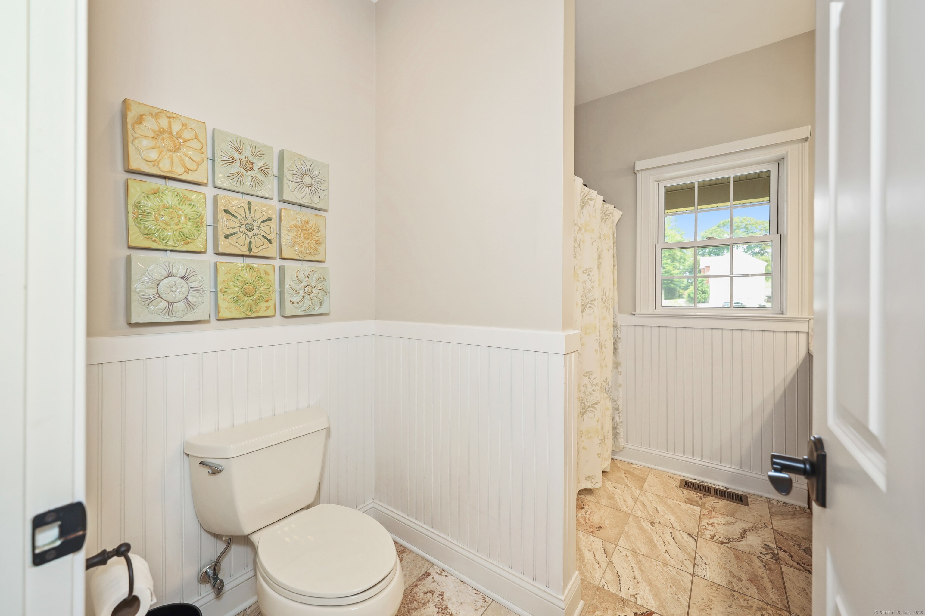 17 Hunters Ridge Wolcott, CT 06716 - Photo 19 of 40 a white toilet sitting next to a window