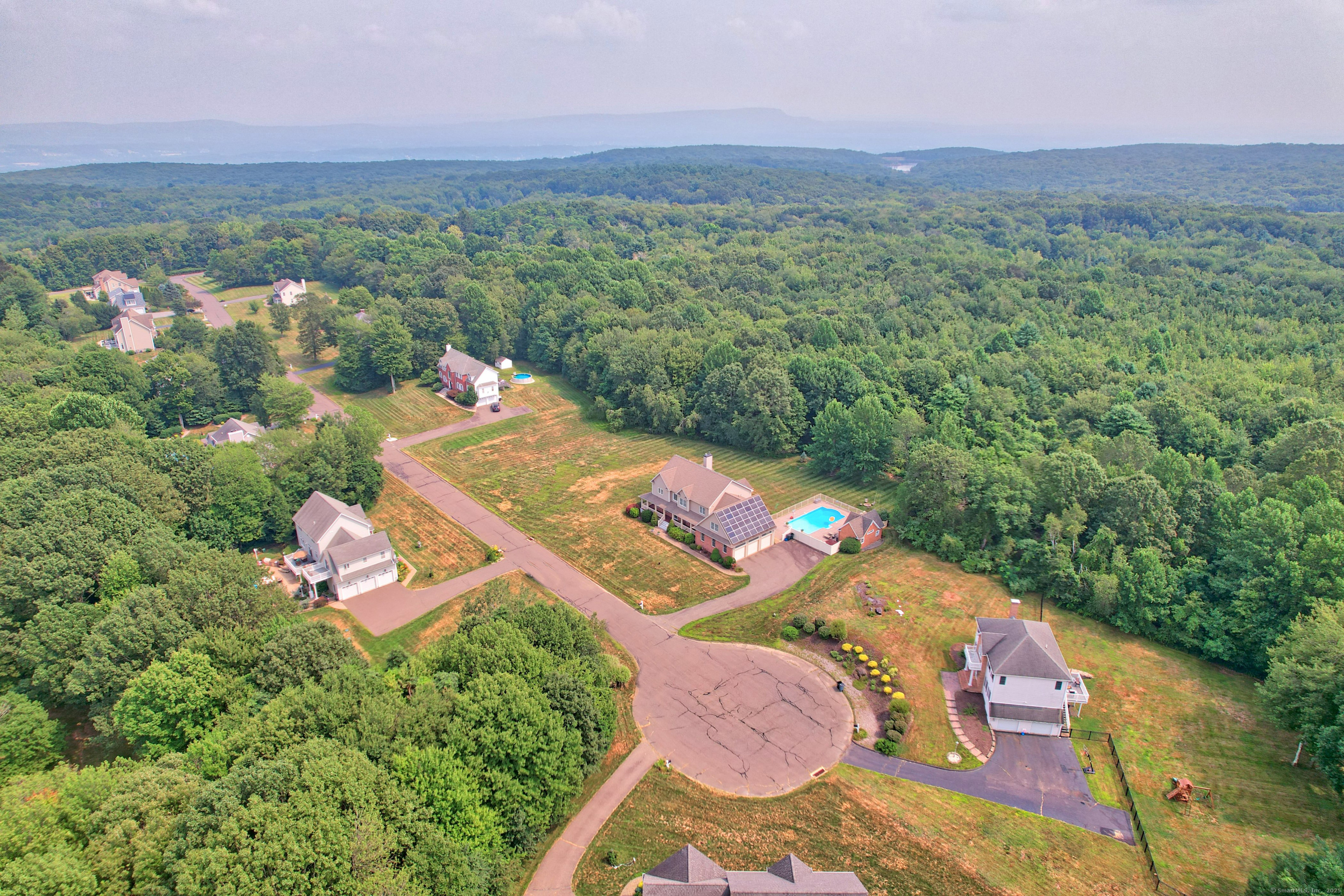 17 Hunters Ridge Wolcott, CT 06716 - Photo 2 of 40 an aerial view of a house with a garden