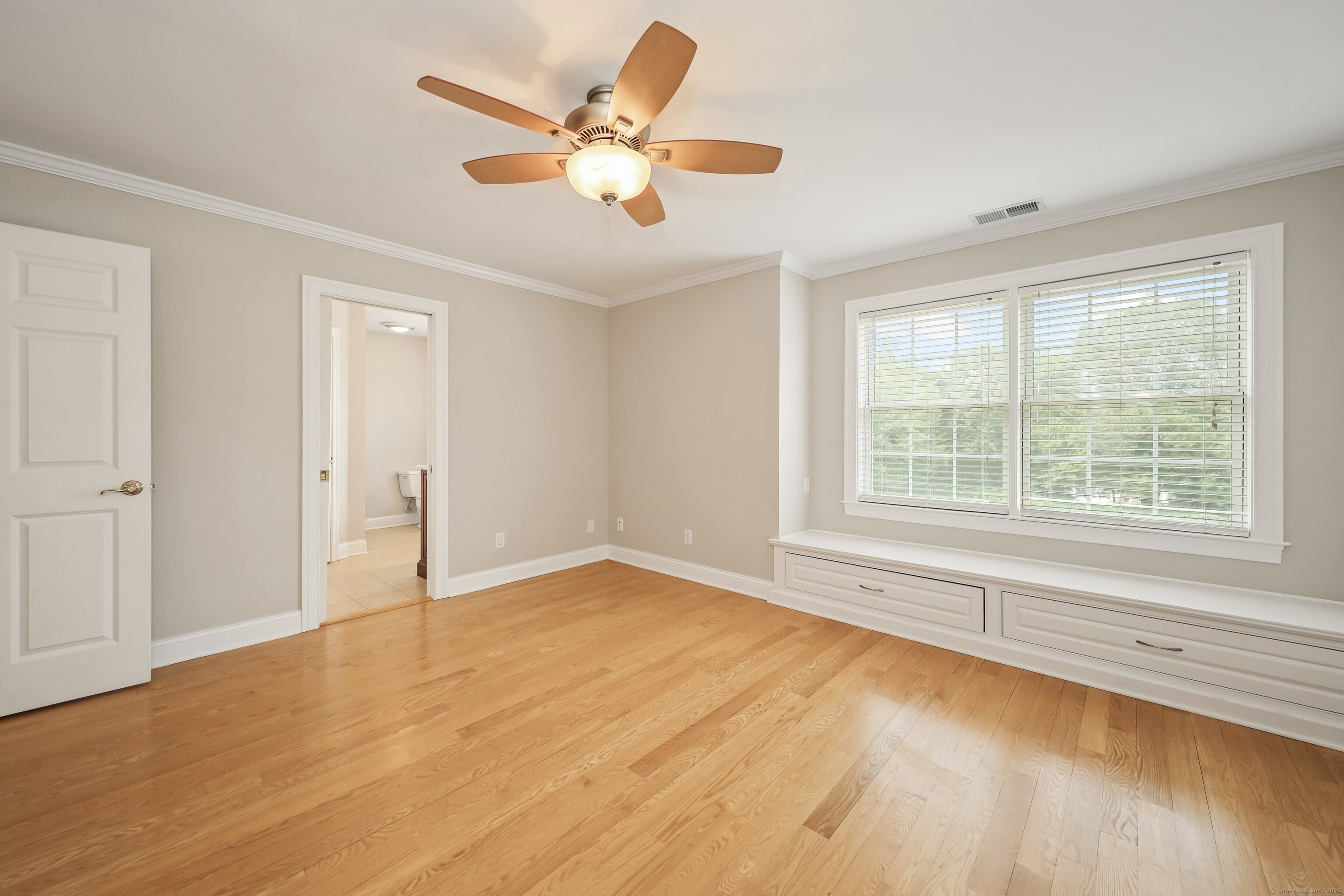 17 Hunters Ridge Wolcott, CT 06716 - Photo 29 of 40 an empty room with wooden floor and windows